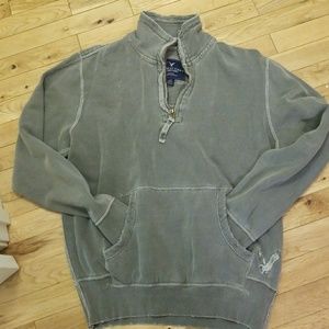 Gray hoodie with distressed area on edges