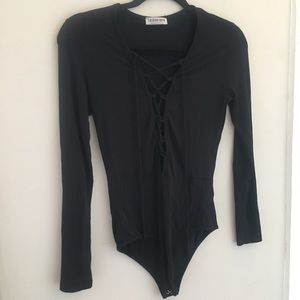 Fashion Nova Tops - Criss cross body suit Fashion Nova Tops - Criss cross body suit