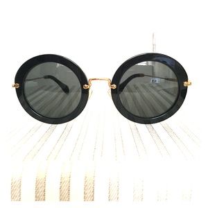 Miu Miu round sunglasses