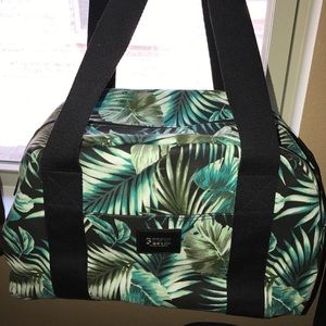 Tropical leaves mini duffle bag
