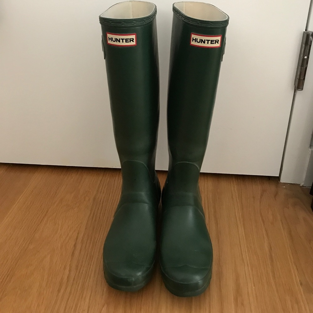 Tall green hunter rain boots