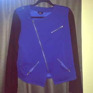 Cobalt blue bomber jacket with zippers.