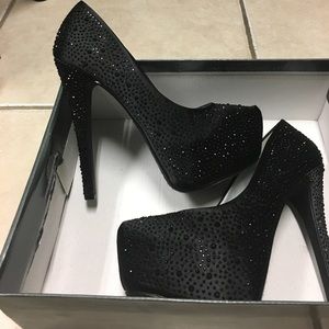 Never worn black sparkly high heels