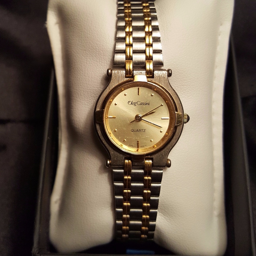 Oleg Cassini silver and gold toned watch