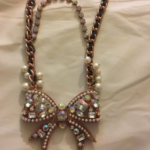 Crystal bow statement necklace
