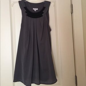 Sleeveless gray top with cinched back