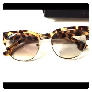 Prada tortoise and gold sunglasses