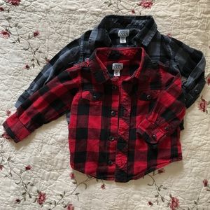 Two buffalo plaid button up shirts.