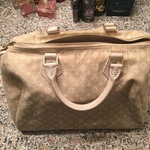 Louis Vuitton Bag used with some signs of ware .