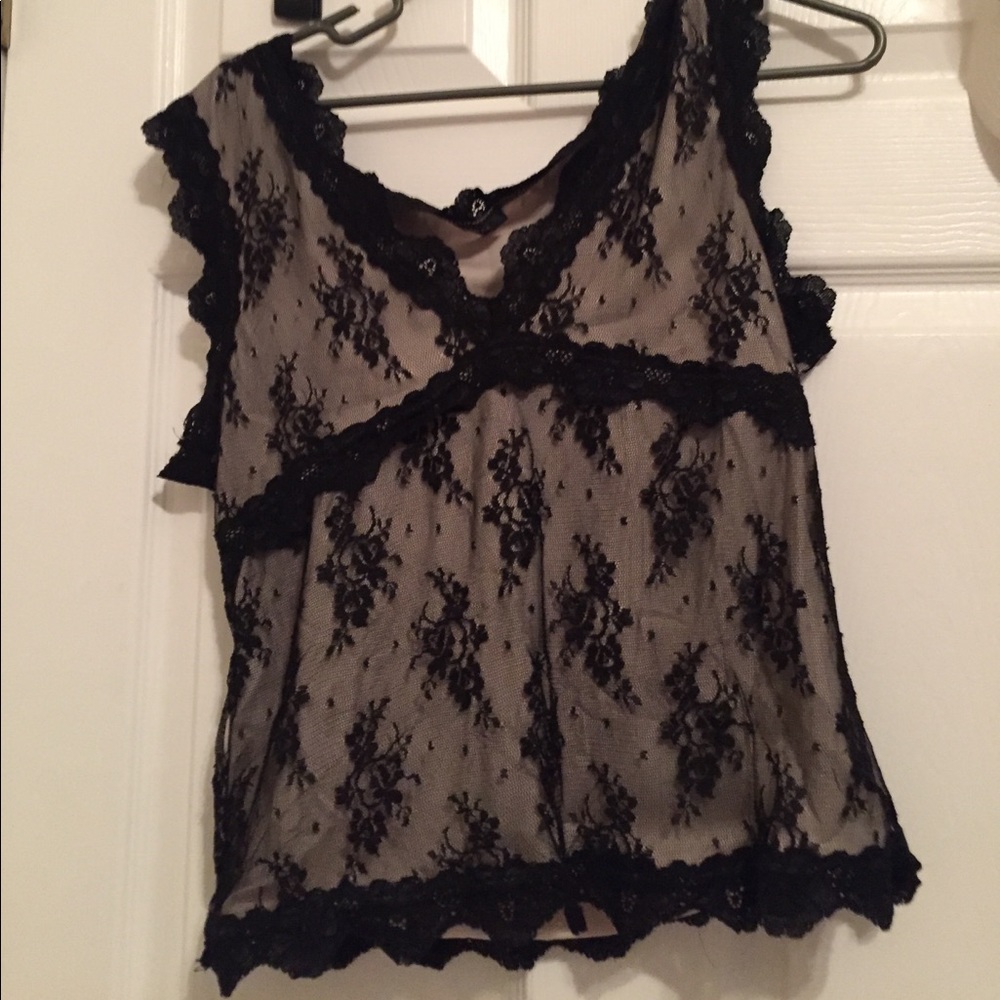lacy cute top about a medium to large
