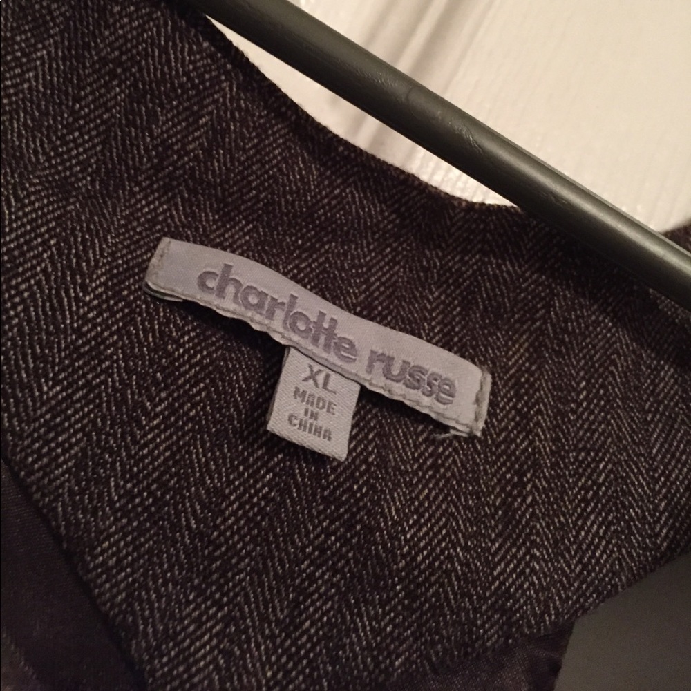 brown vest type thing