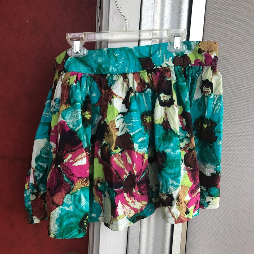 green-blue floral print miniskirt