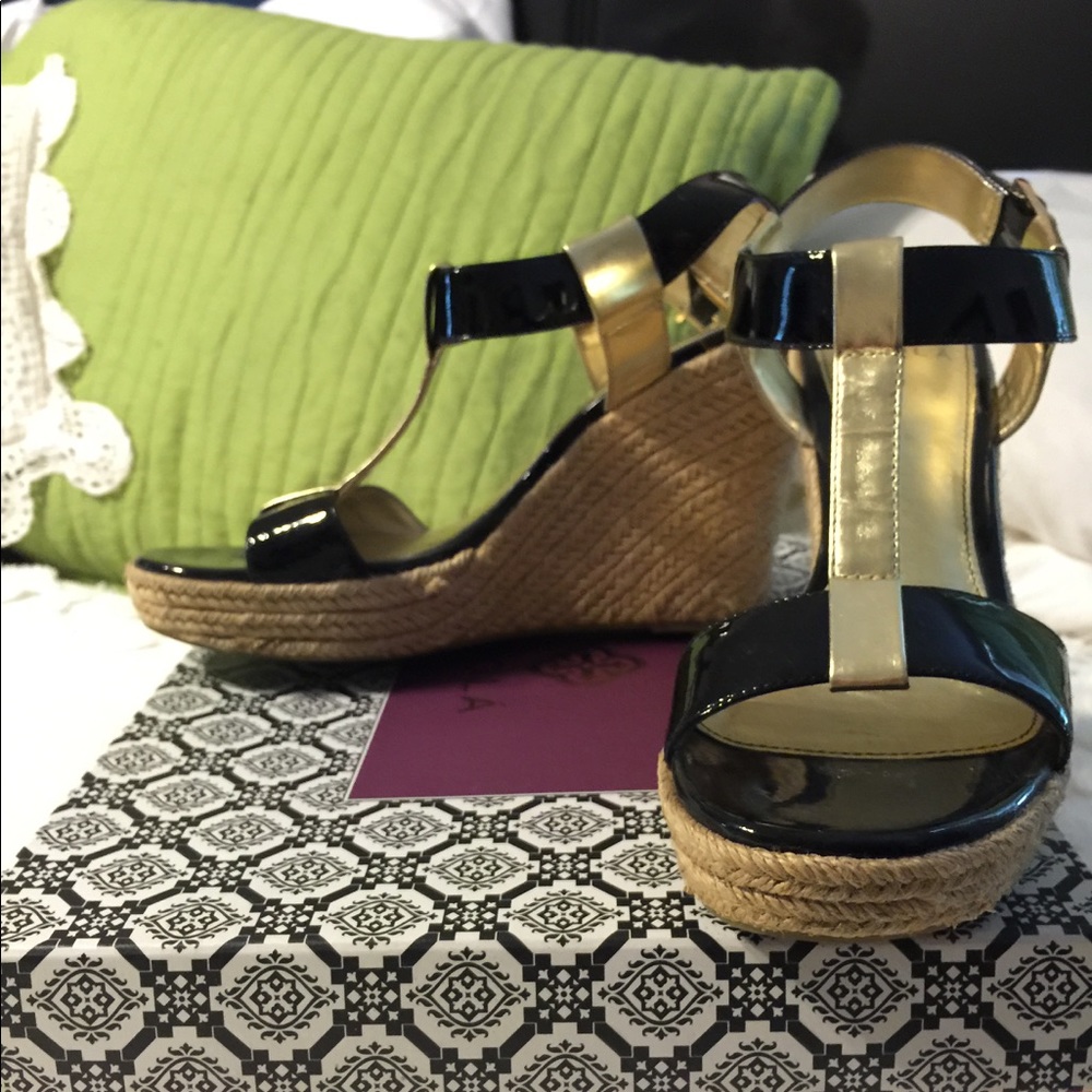 Isola wedge sandals.