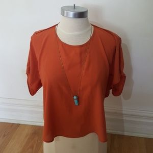 Orange cut out top