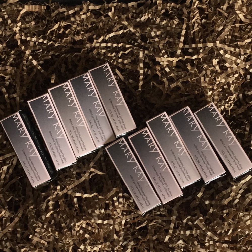 NIB - 10 MK nourishing lip glosses