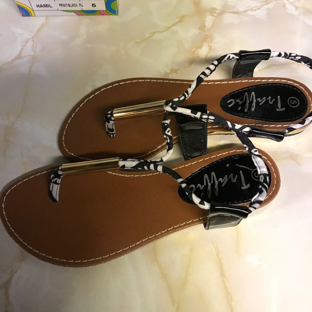 Black and white thong sandals