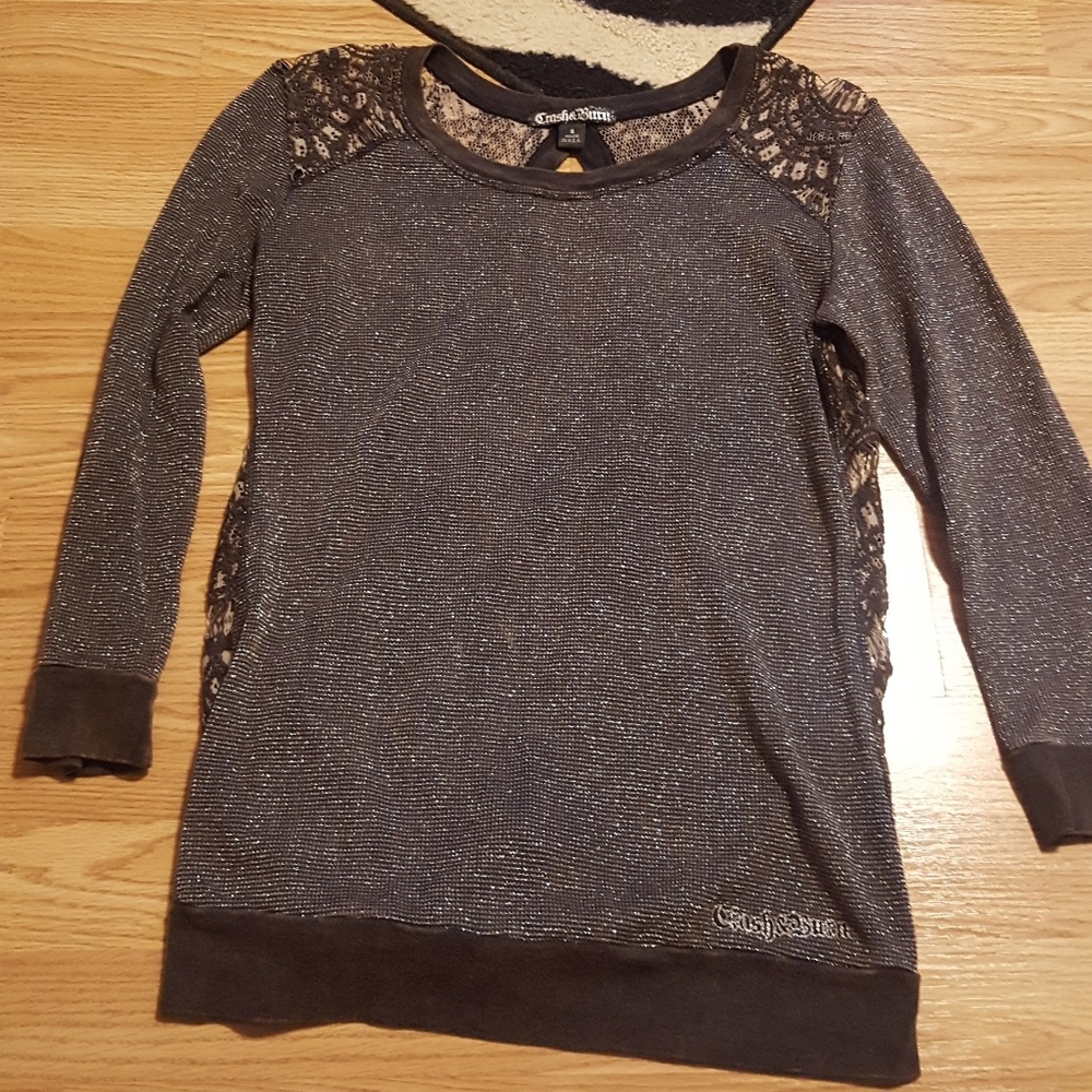 Crash and burn. Open back shirt!