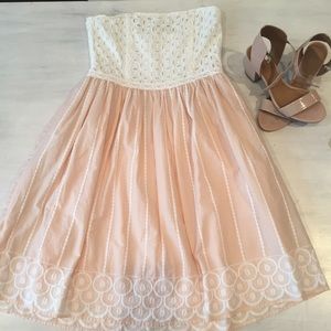 White and pale pink strapless dress