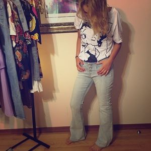 Mid-rise button up bell bottom jeans