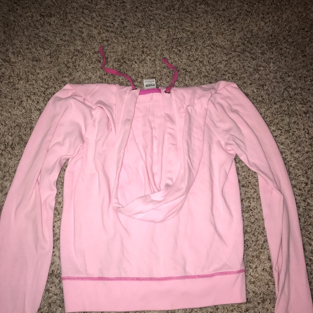 PINK zip up jacket with hood.