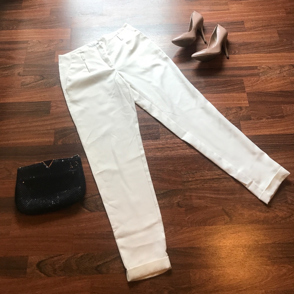 White ankle cuffed pants with belt loops