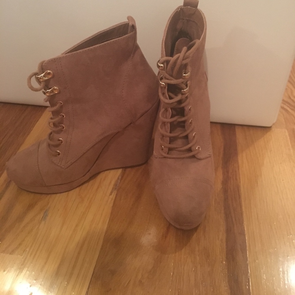 ONLY WORN ONCE. Size 7. Suede tan wedges.