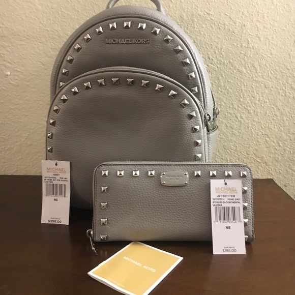 Michael Kors Authentic backpack and wallet leather