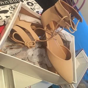 Brad new. Tan. Lace up flats. 7