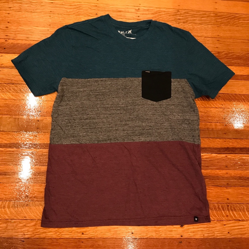 Hurley color block v-neck pocketed tee.