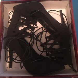 Worn once. Lace up heel. 7. Suede.