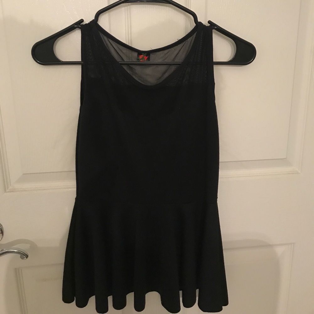 Black peplum top with mesh sleeves