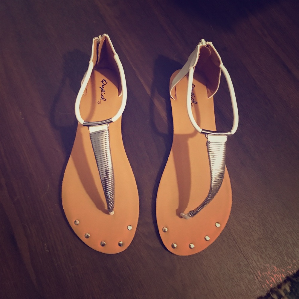 White and silver thong sandals