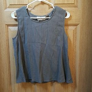 Tank top with short jacket. Bell sleeves.