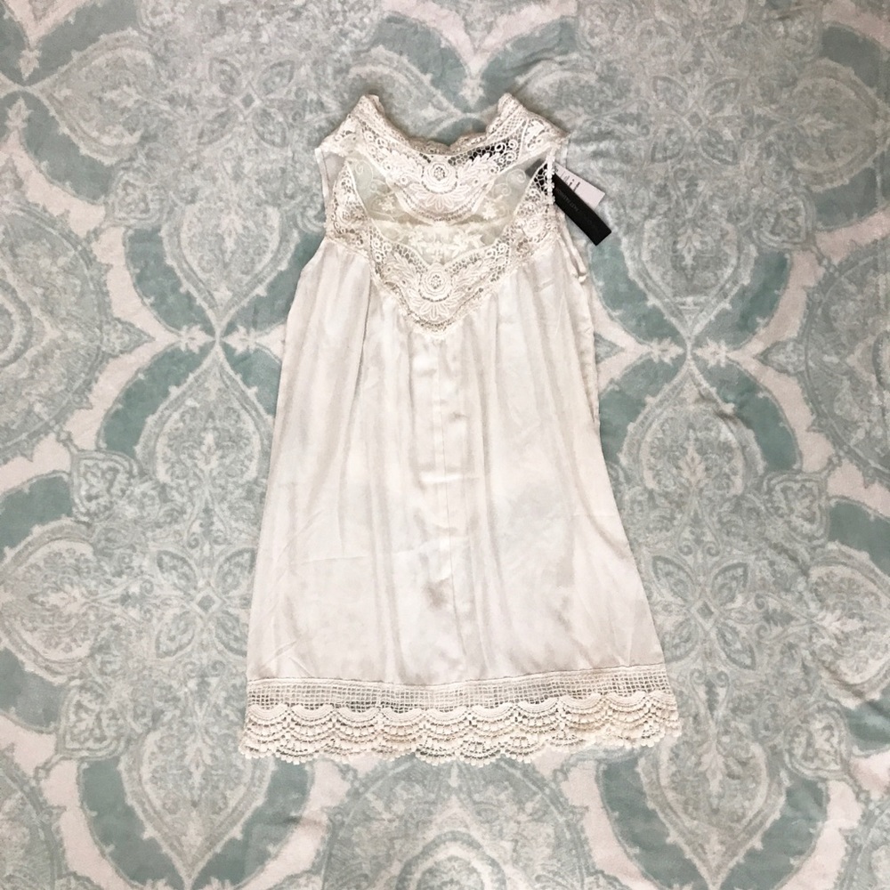 White cover up/dress with crotchet detail.