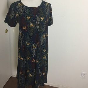 EUC LuLaRoe Carly leggings material Peacock