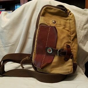 Canvas and leather sling bag.