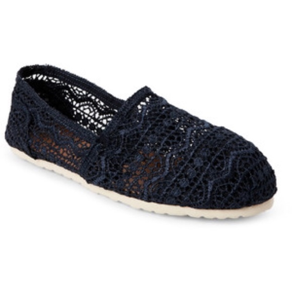 Navy crochet slip ons.