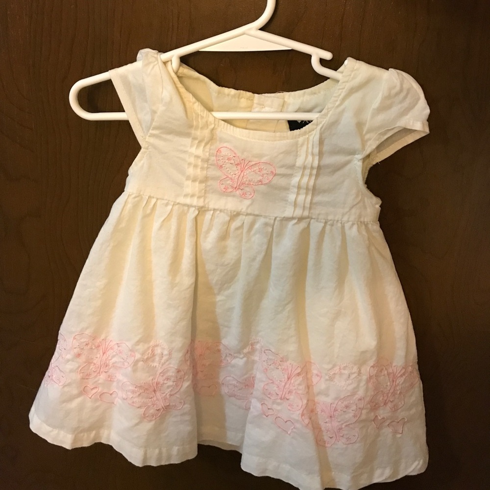 off white dress with pink butterfly embroidery
