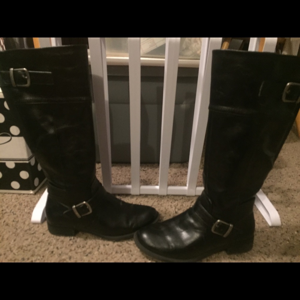 Tall black faux leather boots