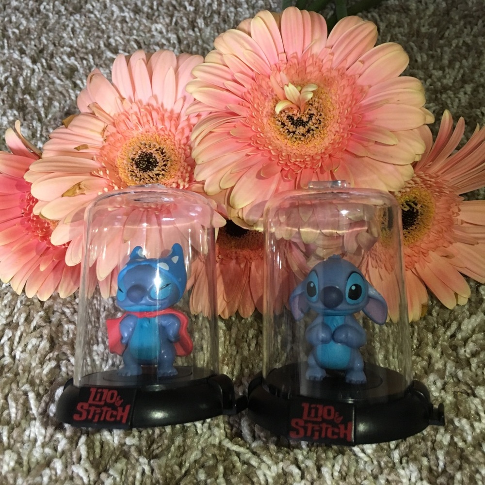 Two Lilo and Stitch Collectible Mini's.💙