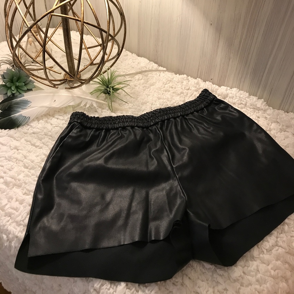 Faux leather athletic style shorts.