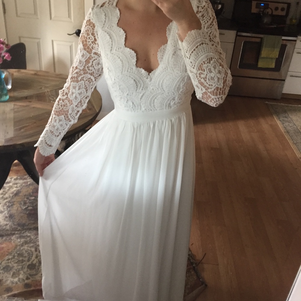 Long white dress with open back and lace top