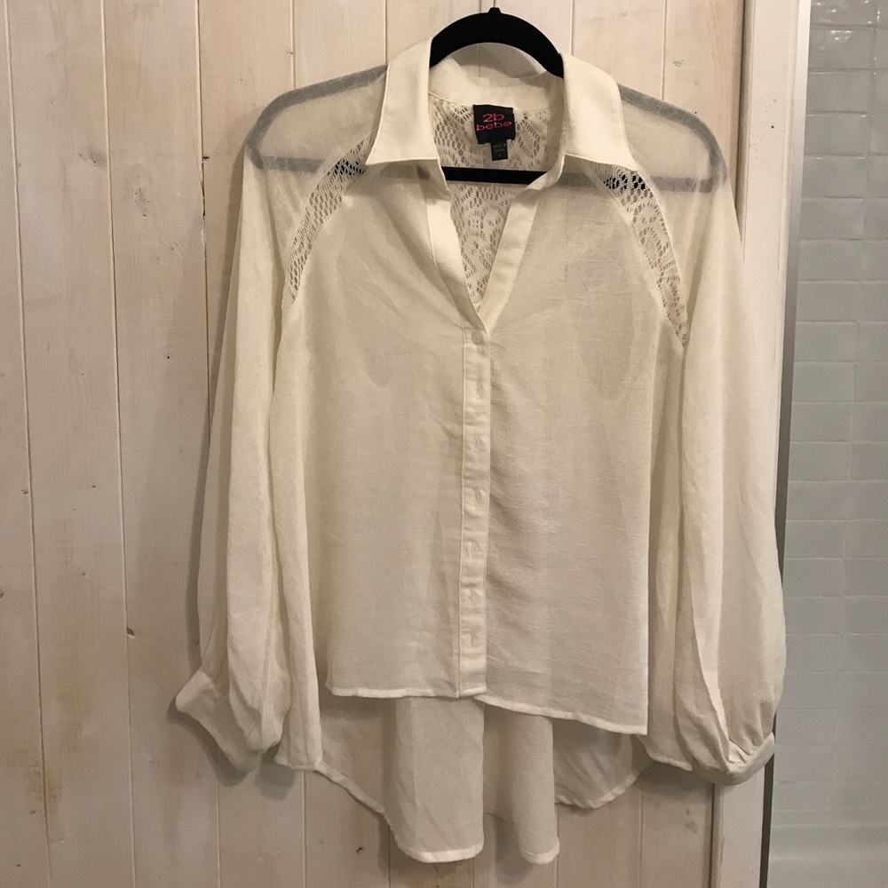 Cut out sheer blouse.