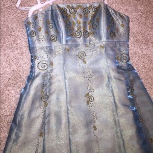 Shimmery teal floor length gown with gold beading