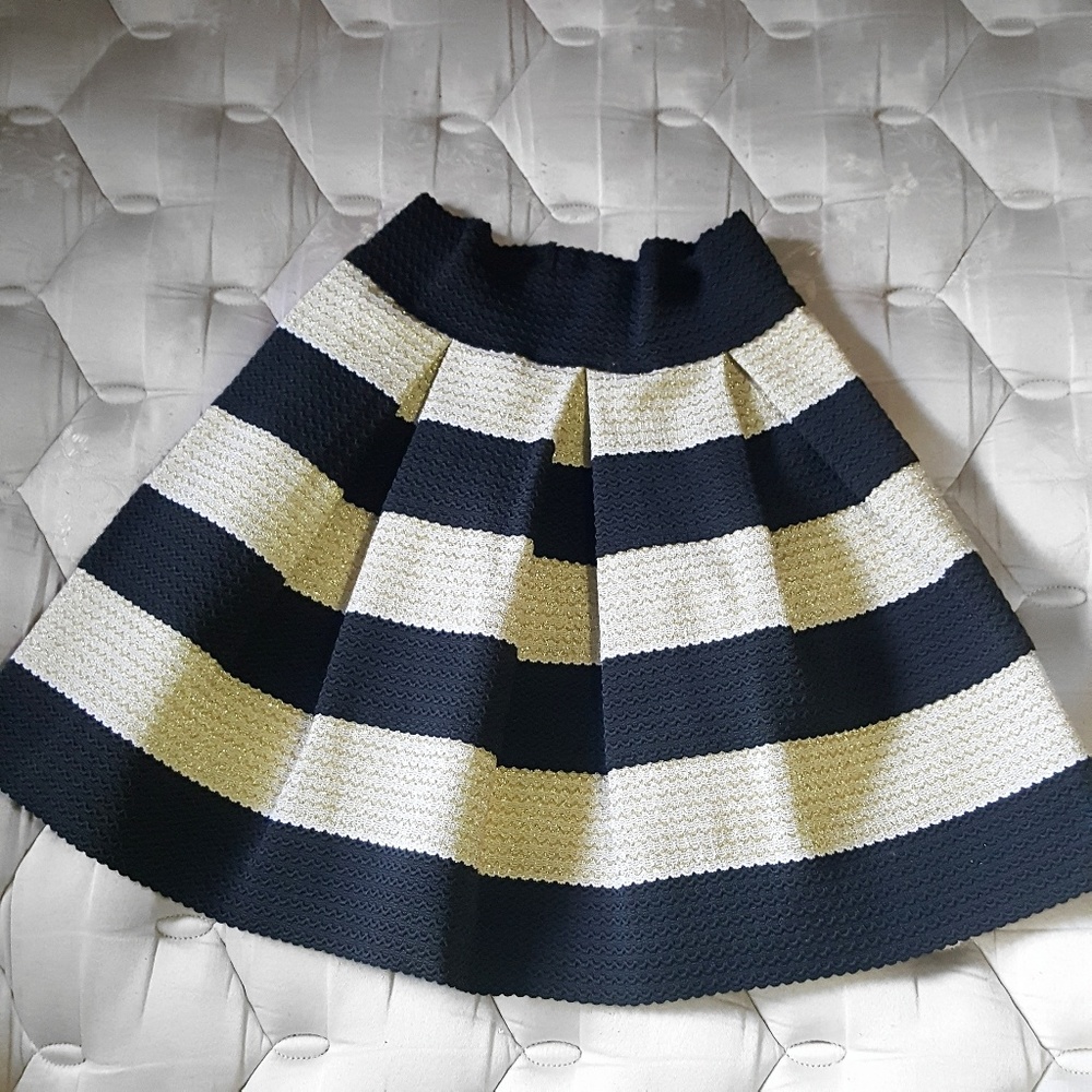 Black and gold pleated skirt