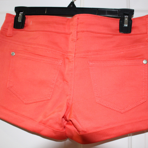 Get noticed with these orange sexy shorts - Picture 2 of 2