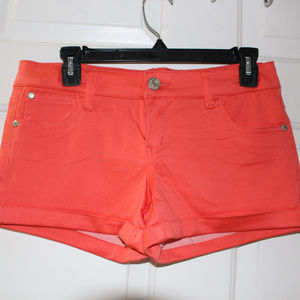 Get noticed with these orange sexy shorts
