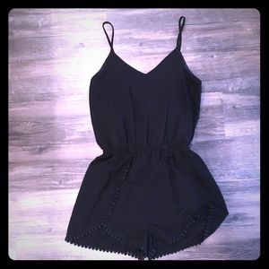 Adorable Black Romper size S.