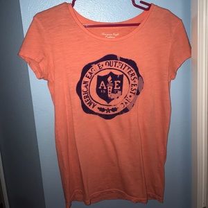 Orange T-shirt with Purple American Eagle logo