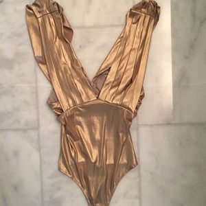 Gold body suit